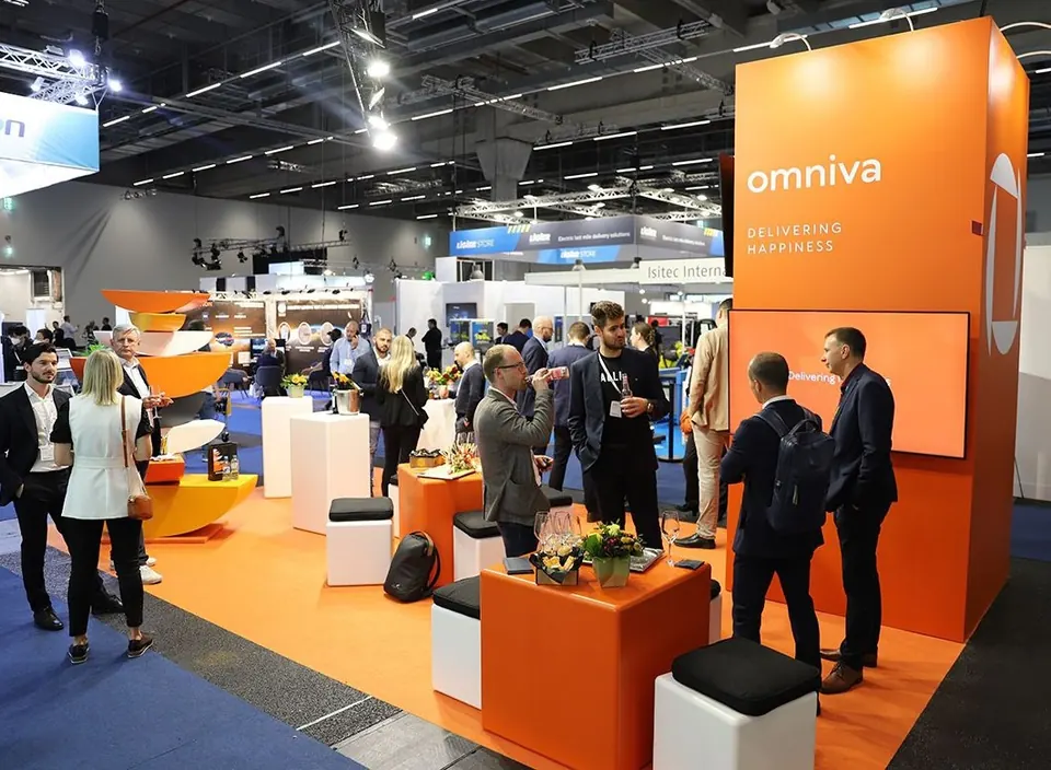 OMNIVA stand at PARCEL+POST EXPO 2022, Germany. Exhibition stand design, production and installation by EVENT MORE